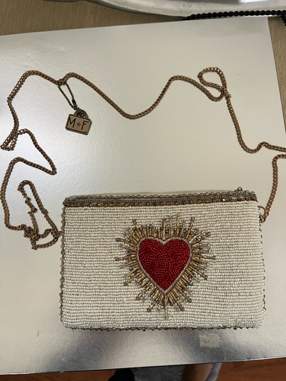 Mary Frances Heart Burst Crossbody phone bag; bead work bag; removable strap.